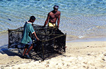 Father and son with fishtrap