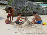 Family Building Sand Castles
